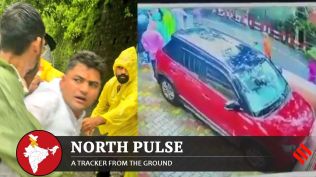 Panchayat member Dikar Singh Mewari being dragged away on August 14, polling day.