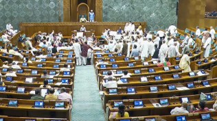 Opposition MPs protest in the Lok Sabha during the Monsoon session of Parliament