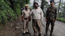 Accused Sumit Sood during the recreation of the crime scene in Shimla