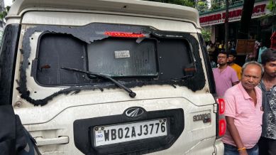 the convoy was passing through the Khagrabari area, stones were pelted at the convoy, and cars were attacked with bamboo poles