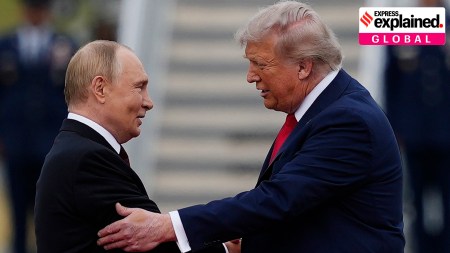 President Donald Trump greets Russia's President Vladimir Putin in Alaska on Friday