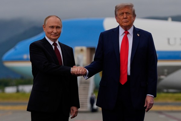Trump Putin Alaska summit, Trump Putin handshake, Trump Putin meeting Anchorage, Joint Base Elmendorf-Richardson summit, Alaska 2025 summit, US Russia summit Alaska, Trump Putin red carpet greeting, Trump Putin military flyover, B-2 stealth bomber Alaska, Trump Putin fighter jets, Trump Putin The Beast limousine, US presidential limousine, The Beast presidential car, Trump Putin ride together, The Beast security features, Trump Putin Alaska photos, Trump Putin Anchorage meeting, Trump Putin August 2025 summit, US Russia diplomatic meeting, Trump Putin Alaska news