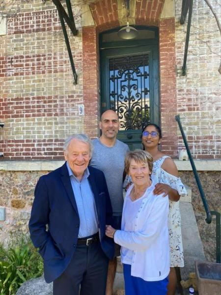 With parents and brother