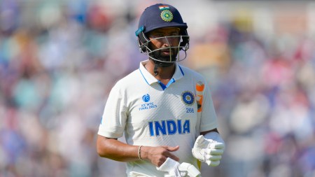 India's Cheteshwar Pujara walks off the pitch after being given out caught behind off the bowling of Australia's Pat Cummins on the fourth day of the ICC World Test Championship Final between India and Australia at The Oval cricket ground in London, Saturday, June 10, 2023. (AP Photo)