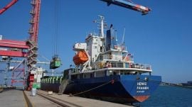 Containers loaded with humanitarian aid for the people of Gaza, including flour, pasta, baby food and canned goods, loaded aboard a ship at Cyprus