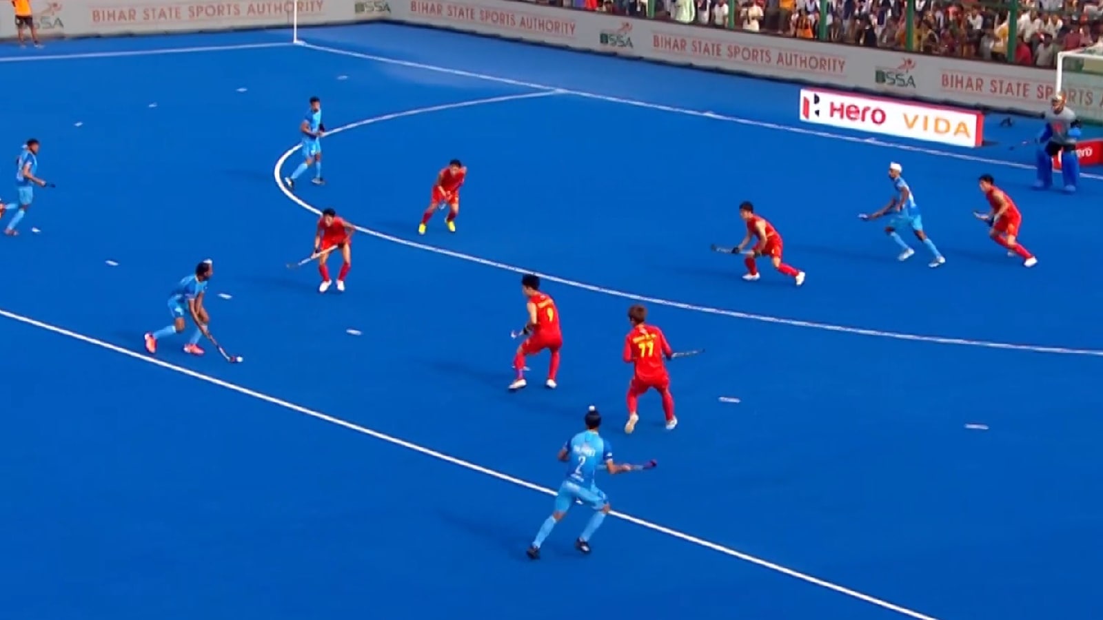 Hardik Singh had to confront two waves of Chinese defence as he tried to pass the ball forward. (Screengrab)