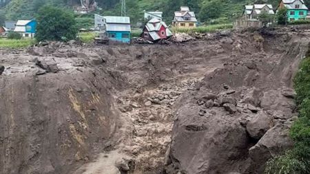 **EDS: SCREENSHOT VIA VIDEO** Kishtwar: Houses damaged at an area after a massive cloudburst at Chasoti village, in Jammu and Kashmir's Kishtwar district, Thursday, Aug. 14, 2025. At least 12 people were killed in the incident, according to officials. Chasoti is the last motorable village on the way to the Machail Mata temple. (PTI Photo) (PTI08_14_2025_000225B)