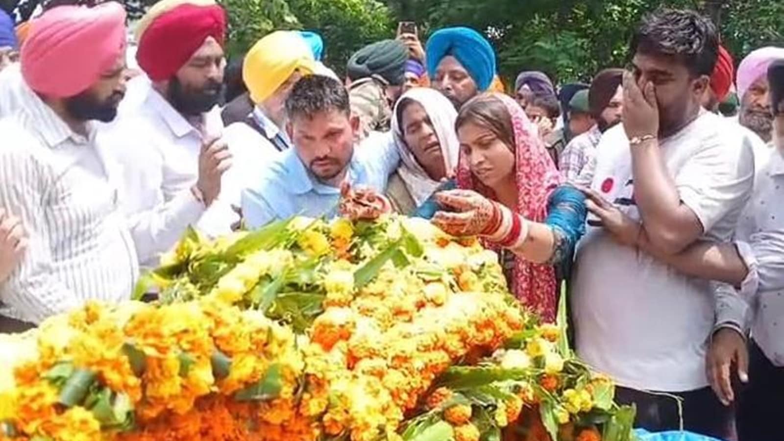 Red choora still on her wrists, wife bids adieu to Ludhiana soldier; cremated with full military honours | Chandigarh News