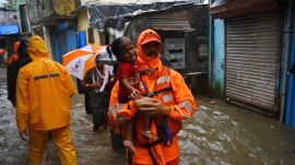 Mithi River flooding Mumbai, Kurla Kranti Nagar flood, Mumbai torrential rain 200 mm rainfall, BMC evacuation operation Kurla,