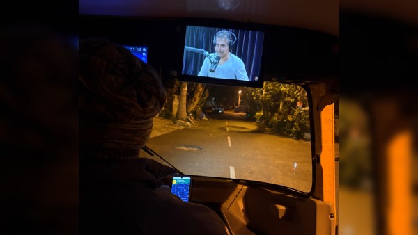 Bengaluru auto driver listening to Naval Ravikant