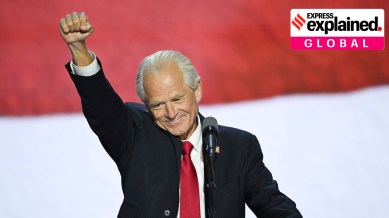 Peter Navarro raises his fist as he speaks at the Republican National Convention in Milwaukee, on July 17, 2024.