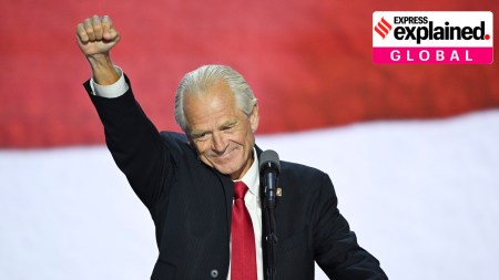 Peter Navarro raises his fist as he speaks at the Republican National Convention in Milwaukee, on July 17, 2024.