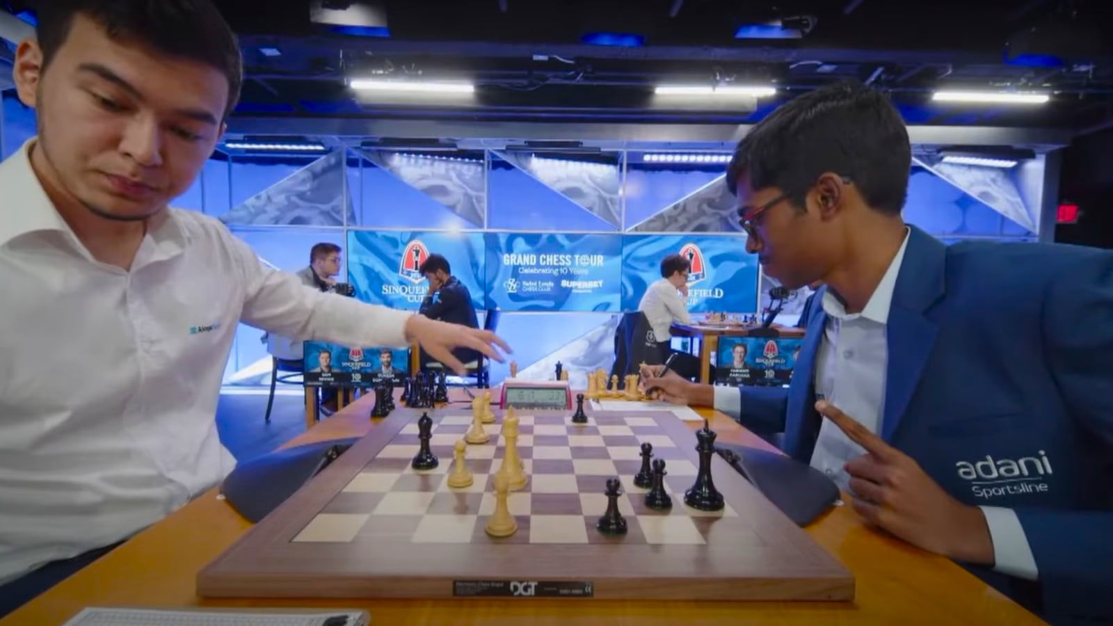 Indian grandmaster Praggnanandhaa reacts as his opponent, Uzbekistan's Nodirbek Abdusattorov, stops the clock to claim a draw one move before in their Sinquefield Cup clash. (Screengrab via YouTube/St Louis Chess Club)