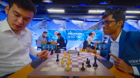 Praggnanandhaa smiles after Nodirbek's incorrect draw claim at Sinquefield Cup. (Screengrab via YouTube/St Louis Chess Club)