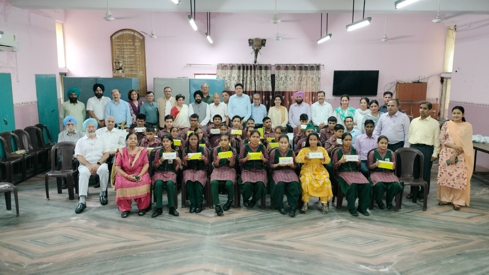 Rotarians gift glasses with machine vision to students at Institute for the Blind