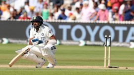 The ball had trickled to the base of the stumps off the face of Siraj's bat. (AP Photo)