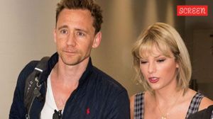 Tom Hiddleston reacts as Taylor Swift is mentioned on live radio