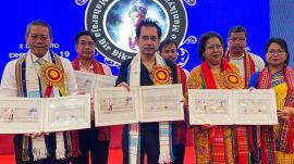 Agartala: Tipra Motha supremo Pradyot Kishore Manikya Debbarma, centre, with others during release of a special poster cover to mark the 117th birth anniversary of Maharaja Bir Bikram Kishore Manikya, in Agartala, Monday, Aug. 18, 2025. Maharaja Bir Bikram is considered the architect of modern Tripura. His birth anniversary is on August 19. (PTI Photo) (PTI08_18_2025_000426B)