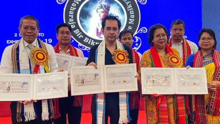 Agartala: Tipra Motha supremo Pradyot Kishore Manikya Debbarma, centre, with others during release of a special poster cover to mark the 117th birth anniversary of Maharaja Bir Bikram Kishore Manikya, in Agartala, Monday, Aug. 18, 2025. Maharaja Bir Bikram is considered the architect of modern Tripura. His birth anniversary is on August 19. (PTI Photo) (PTI08_18_2025_000426B)