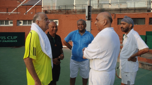 Dr Vece Paes (in blue) with then CLTA president Rajan Kashyap (second from right) at CLTA Stadium in 2013.