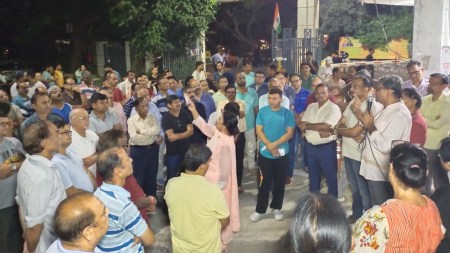 On Sunday, residents protested in front of the Akshardham apartment gate
