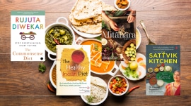 Book covers of books about Indian diet superimposed on a picture of Indian food