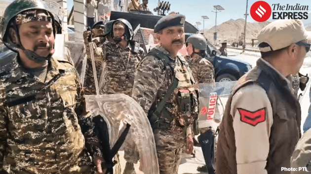 police deploy tear gas and wield batons to disperse the crowd,