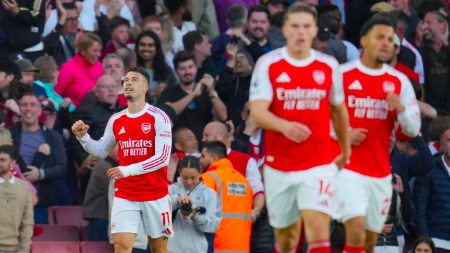 Arsenal's Gabriel Martinelli reacts after scoring during the Premier League soccer match between Arsenal and Manchester City in London on Sunday. (AP Photo)