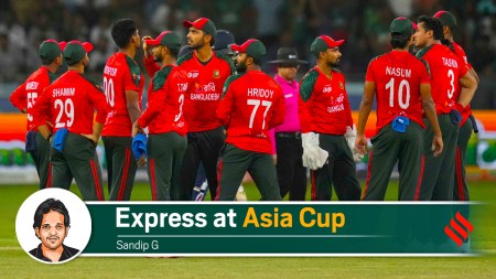 Bangladesh players await the television umpire's decision for the wicket of Sri Lanka's Kusal Perera during the Asia Cup cricket match between Bangladesh and Sri Lanka at Dubai International Cricket Stadium in Dubai, United Arab Emirates, Saturday, Sept. 20, 2025. (AP Photo)