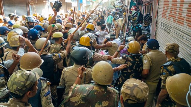 Security personnel lathi-charge protesters during a demonstration over the issue of 'I Love Mohammad' posters, in Bareilly, Uttar Pradesh, Friday, Sept. 26, 2025. (PTI Photo)