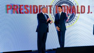 FILE — Charlie Kirk, right, the right-wing influencer and founder of Turning Point USA, is joined onstage by President Donald Trump at the Teen Student Action Summit in Washington on July 23, 2019. Kirk was among the faithful who had helped Trump build a comeback after the Jan. 6, 2021, attack on the Capitol made him a political outcast. Trump brought him into his second-term inner circle. (Doug Mills/The New York Times)