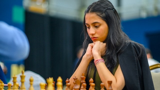 Divya Deshmukh considers her next move against Alexander Donchenko in round 2 of the FIDE Grand Swiss tournament in Samarkand. (PHOTO: FIDE/Michal Walusza)