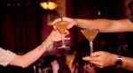 Dirty martinis change hands at KGB Bar in New York on July 29, 2025. Gen Z was alive during a week of supper clubs, daytime raves and rooftop ragers in New York City. (Marissa Alper/The New York Times)