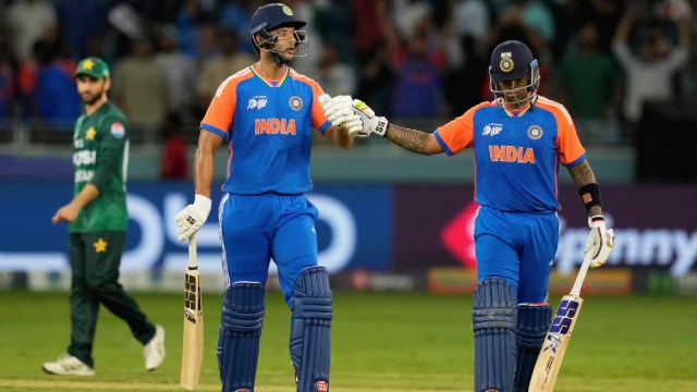 India's captain Suryakumar Yadav, right, celebrates with batting partner Shivam Dube after their win in the Asia Cup cricket match against Pakistan at Dubai International Cricket Stadium in Dubai, United Arab Emirates, Sunday, Sept. 14, 2025. (AP Photo/Altaf Qadri)