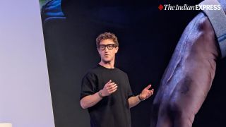Meta CEO Mark Zuckerberg shows off the new Ray-Ban Display smart glasses during the company's Connect developer conference on September 17 in Menlo Park, California. (Image credit: Anuj Bhatia/Indian Express)
