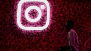 A man walks past a logo of the mobile application Instagram, during a conference in Mumbai, India, September 20, 2023. (File Photo: REUTERS/Francis Mascarenhas)