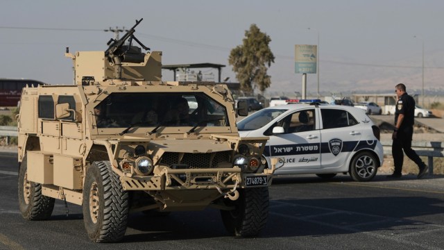 Two Israelis killed in gun and knife attack near West Bank