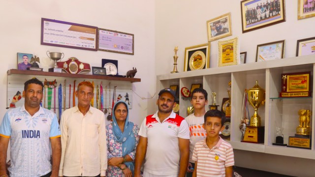 The parents and uncles of Jaismine Lamboriya at their home in Bhiwani. (Express Photo by Kamleshwar Singh)