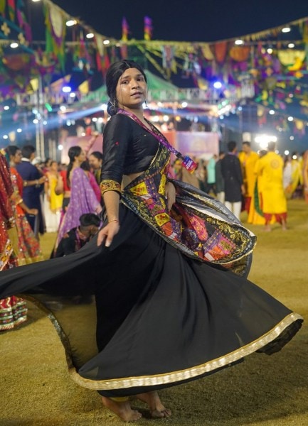 Revellers play garba at the Lukshmi Vilas Palace Heritage held at Moti Baug Cricket Ground. (Express Photo)