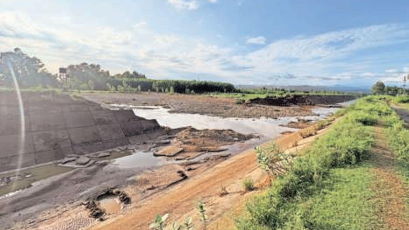 A breach in the canal near Bhedian Buzurg village. A youth drove a JCB into the canal and cut it to divert water into the Ravi river.