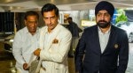 Former cricketer Mithun Manhas, center, and BCCI's joint secretary Prabhtej Singh Bhatia, right, arrive for the board's Annual General Meeting (AGM) at its headquarters, in Mumbai on Sunday. (PTI Photo)