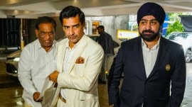 Mithun manhas BCCI president Former cricketer Mithun Manhas, center, and BCCI's joint secretary Prabhtej Singh Bhatia, right, arrive for the board's Annual General Meeting (AGM) at its headquarters, in Mumbai on Sunday. (PTI Photo)