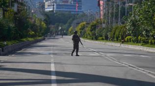 A member of the Nepalese army stands guard on the street of Kathmandu, Nepal, Thursday, Sept. 11, 2025. (AP Photo/Niranjan Shrestha)