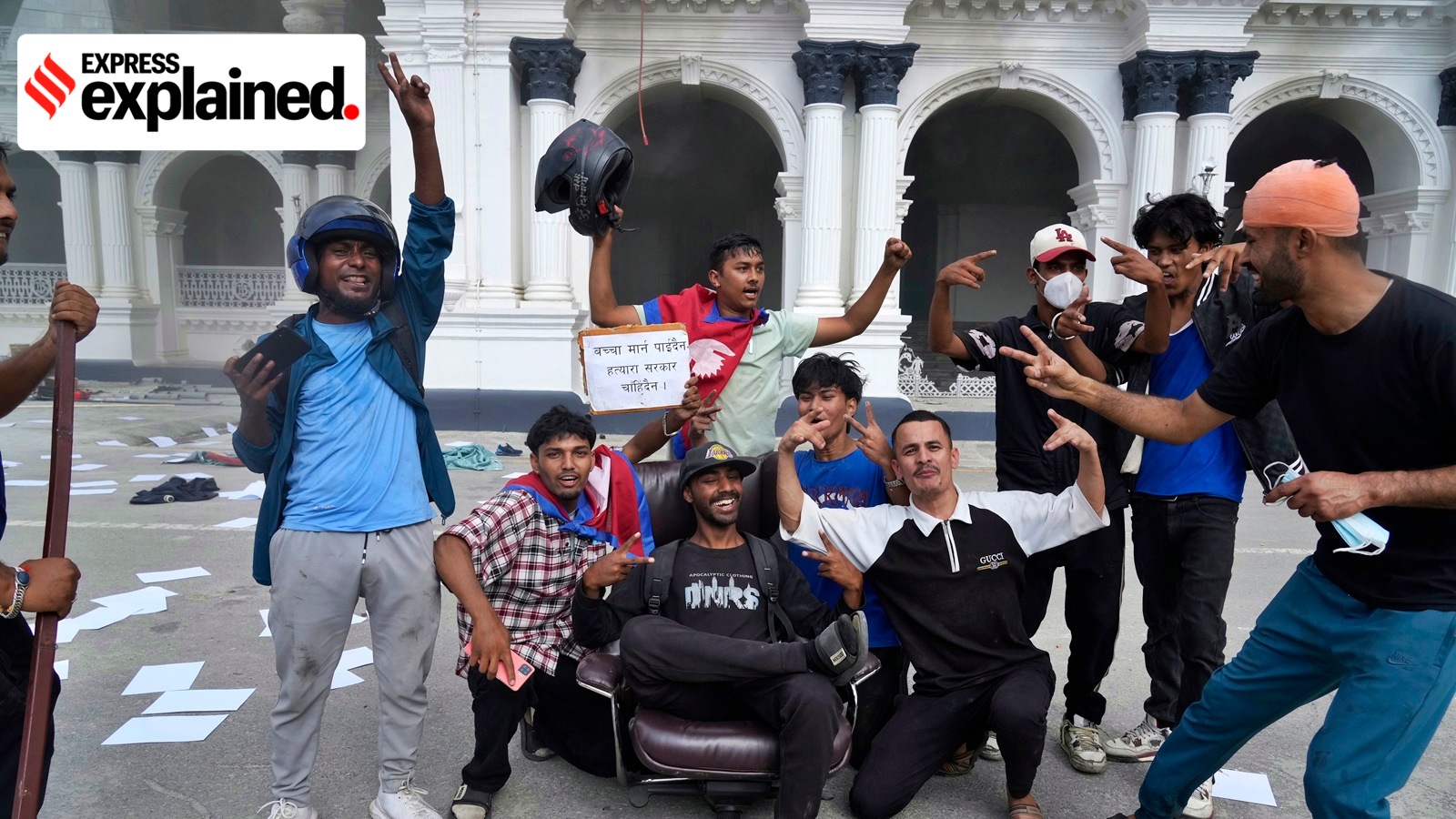 Nepal nepo baby: Protesters celebrate at the Singha Durbar, the seat of Nepal's government's various ministries and offices, after it was set on fire during a protest on Sept. 9, 2025.
