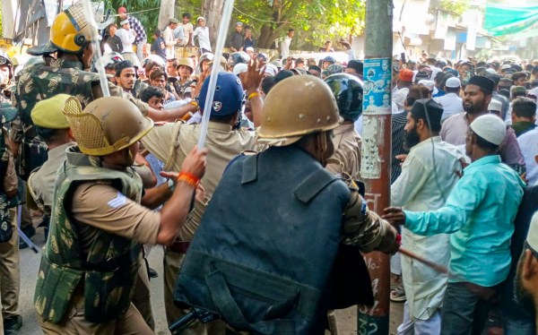 Bareilly: Security personnel lathi-charge protesters during a demonstration over the issue of 'I Love Mohammad' posters, in Bareilly, Uttar Pradesh, Friday, Sept. 26, 2025. (PTI Photo)(PTI09_26_2025_000310B)