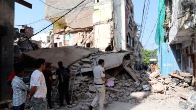 A police personnel at the site after a four-storey building collapsed in North Delhi's Subzi Mandi area, Tuesday, Sept. 9, 2025.