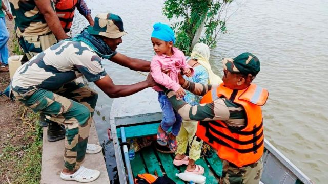 In this image posted on Sept. 2, 2025, BSF personnel evacuate villagers from a flood-hit area in Ferozepur district of Punjab.