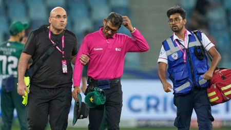 Umpire Ruchira Palliyaguruge was hit by a ball during the Asia Cup cricket match between Pakistan and United Arab Emirates. (AP Photo)