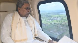 Chief Minister Siddaramaiah conducts an aerial survey of flood-affected regions in North Karnataka on Tuesday. Credit: Chief Minister’s Office