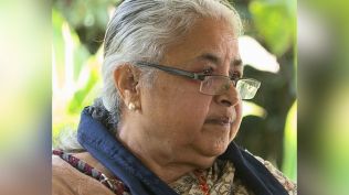 Nepal's Sushila Karki speaks with a staff member of the US Embassy at the Summit for Democracy 2021 (File Photo/Wikimedia Commons)